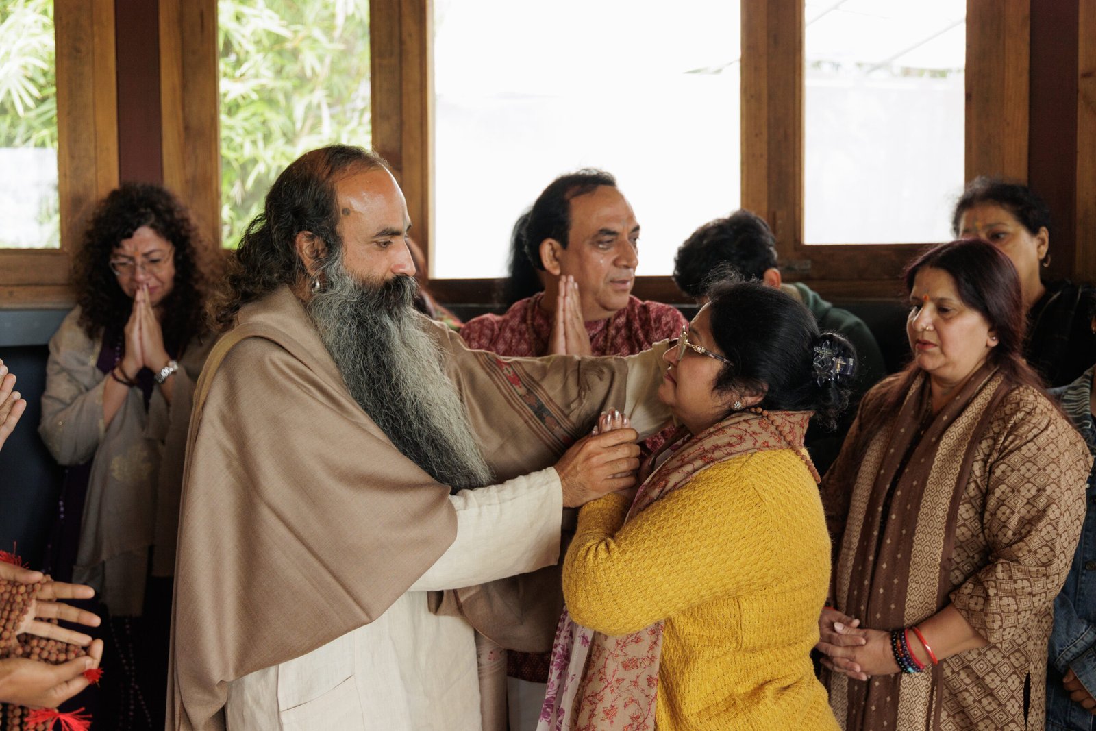 A sadhak softening into emotional ease